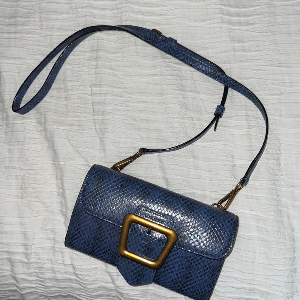 Blue Sam Edelman wallet on chain with gold buckle and strap